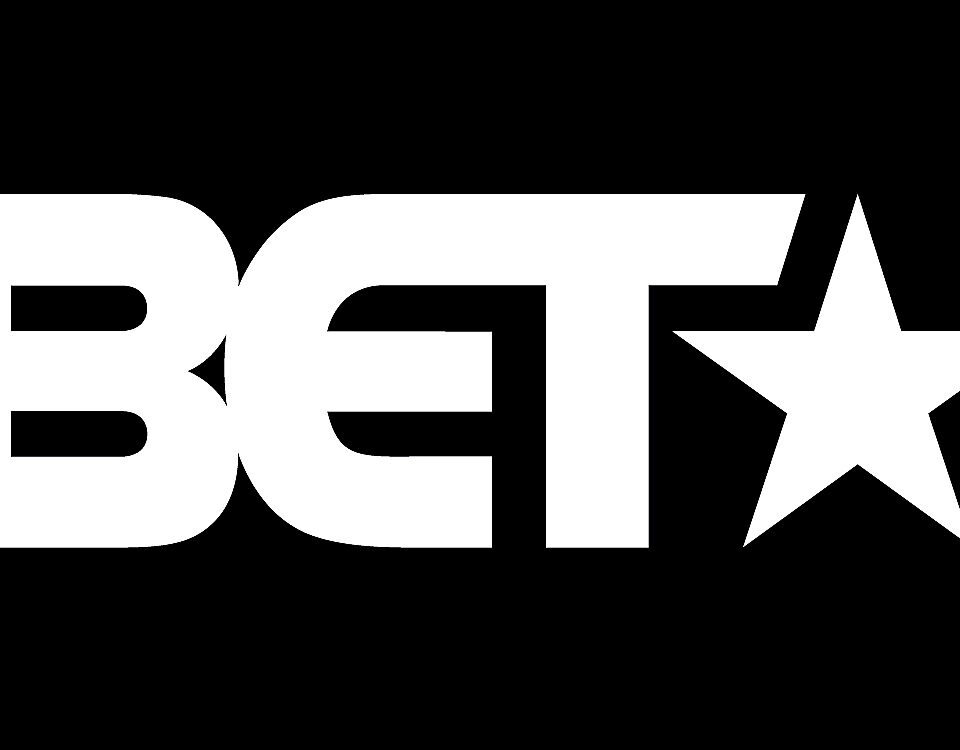 BET logo in white color on black background